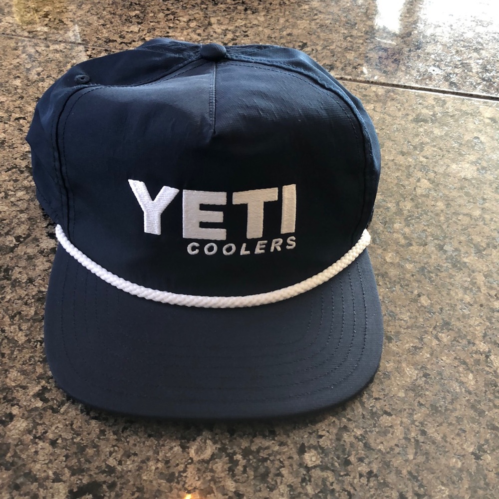 Vintage Yeti Coolers flat brim navy SnapBack hat.